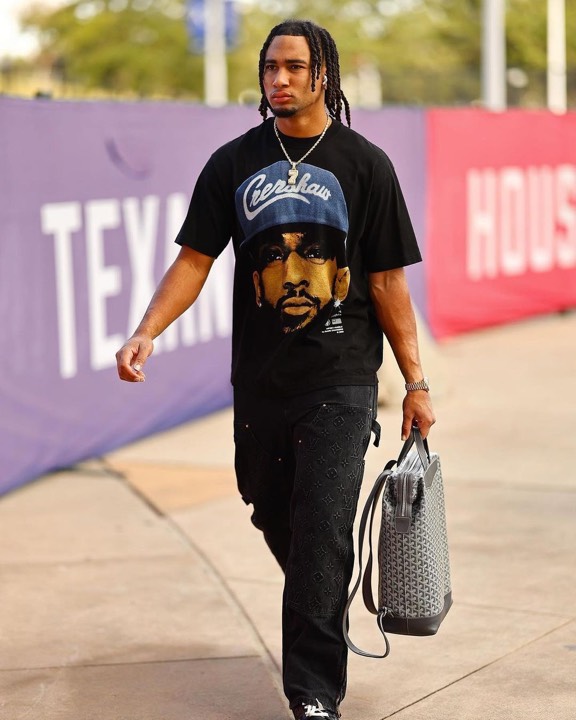 Talent photographed wearing a graphic tee from the programs, photo 6 of 23