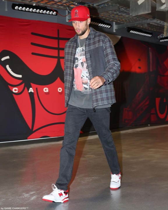 Talent photographed wearing a graphic tee from the programs, photo 19 of 23