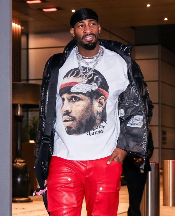 Talent photographed wearing a graphic tee from the programs, photo 3 of 23