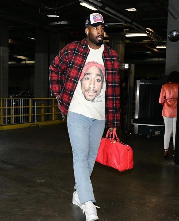 Talent photographed wearing a graphic tee from the programs, photo 8 of 23