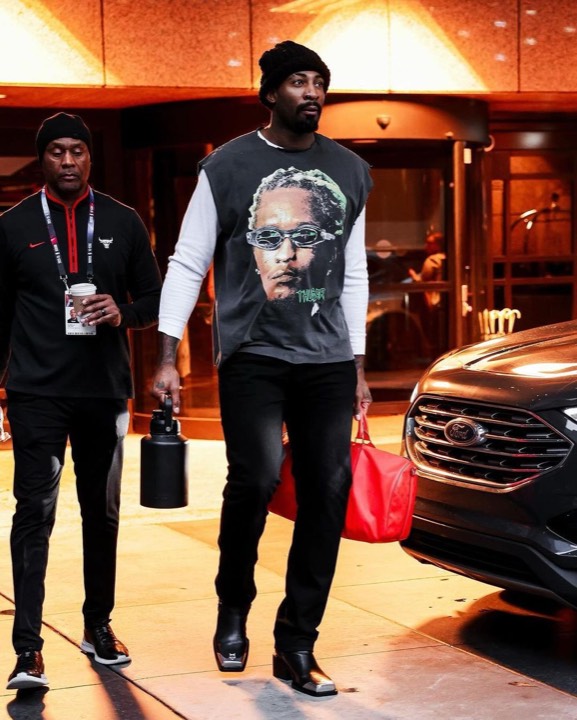 Talent photographed wearing a graphic tee from the programs, photo 12 of 23