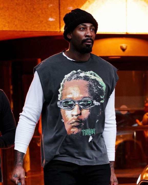 Talent photographed wearing a graphic tee from the programs, photo 5 of 23