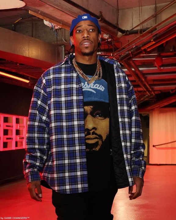 Talent photographed wearing a graphic tee from the programs, photo 10 of 23