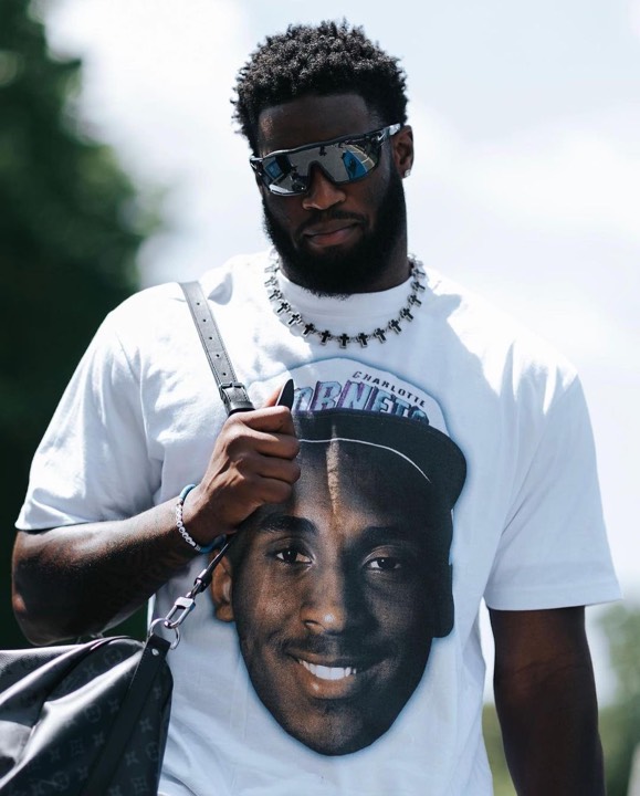 Talent photographed wearing a graphic tee from the programs, photo 2 of 23