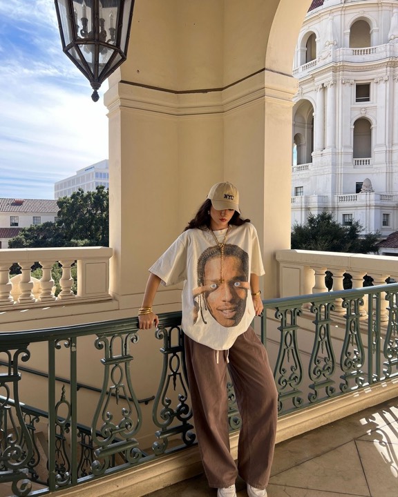 Talent photographed wearing a graphic tee from the programs, photo 22 of 23