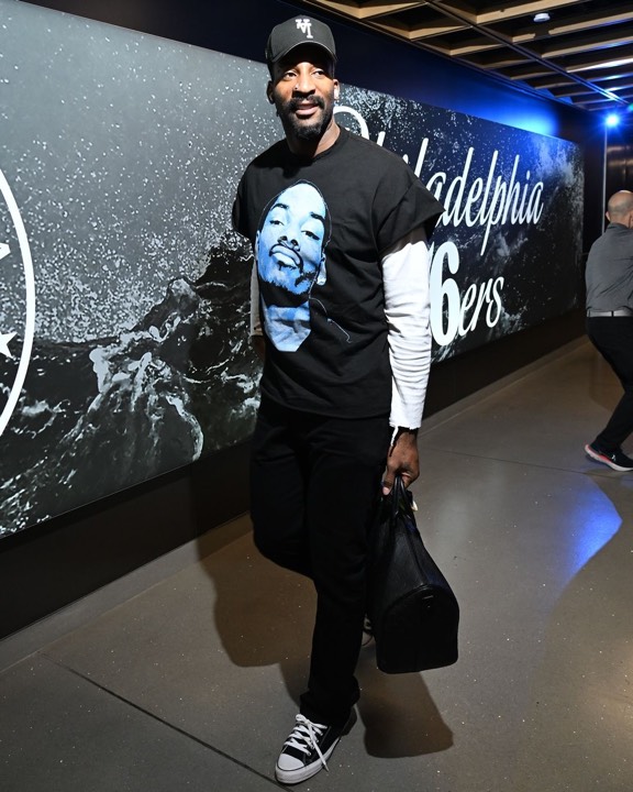 Talent photographed wearing a graphic tee from the programs, photo 17 of 23