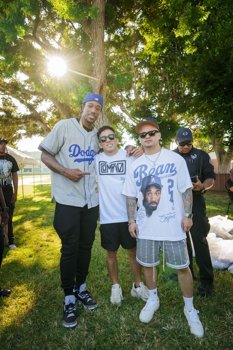 DeMar DeRozan with two members of the Comp10 team at Compton Fest